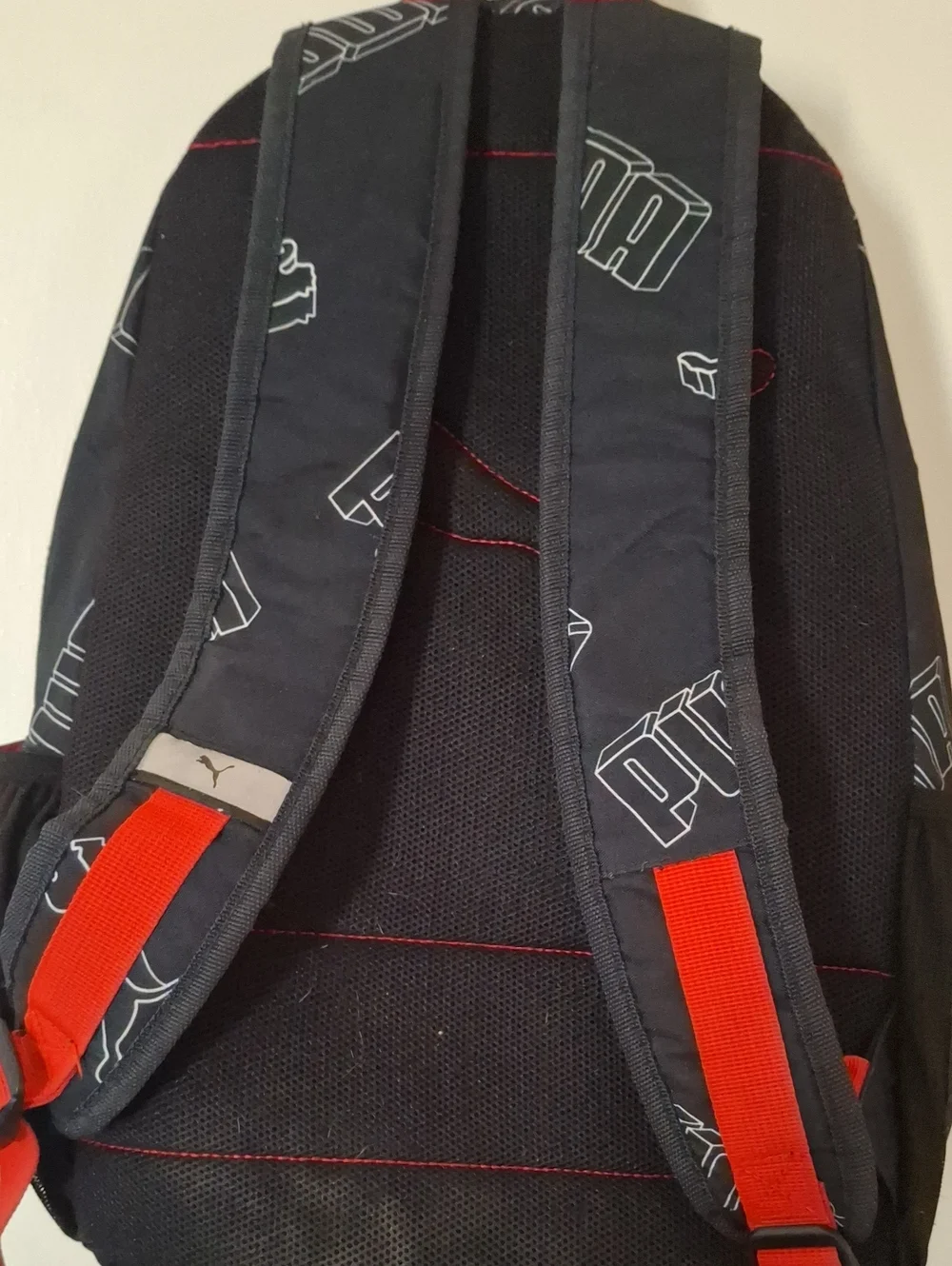 Puma Black Backpack with Red Accents and White Logo Print